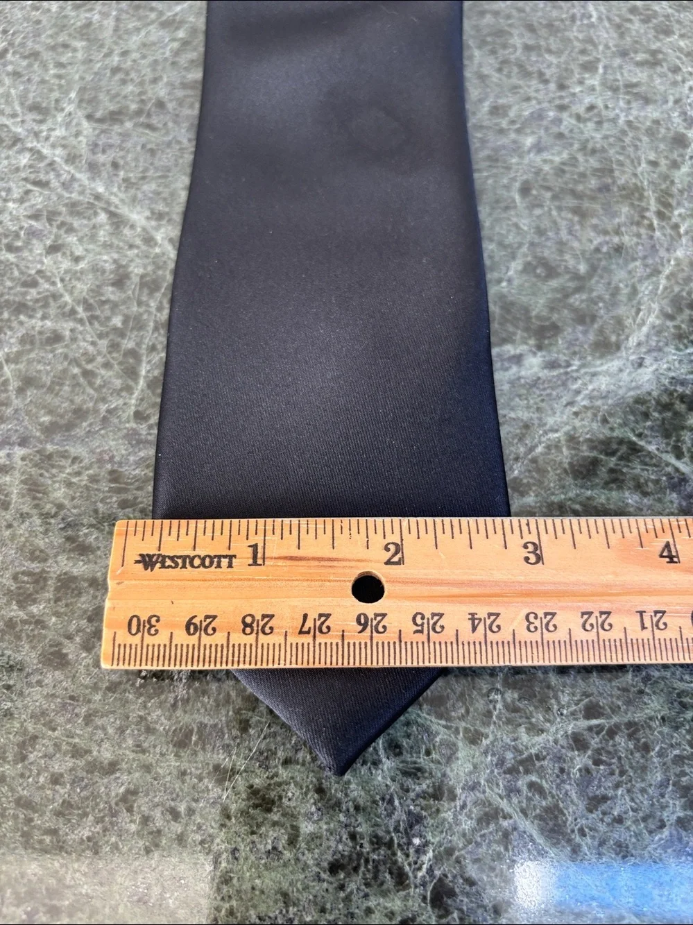 Structure Neckwear solid black tie features a classic, smooth satin finish.